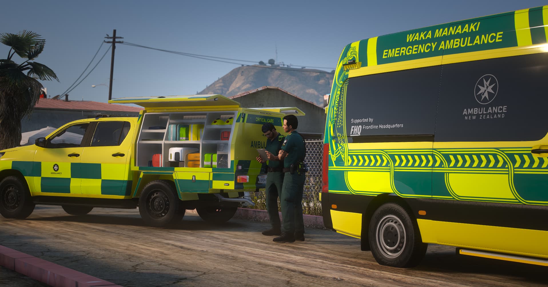 Bay of Plenty Roleplay Ambulance New Zealand crew and vehicles on scene, with Mauao in the background